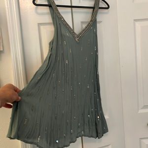 Free People guaze fabric khaki green w/muted gold-like hardware on dress